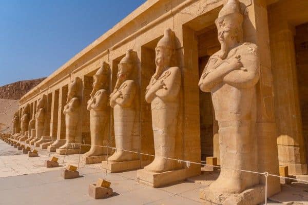 Row of ancient Egyptian statues.