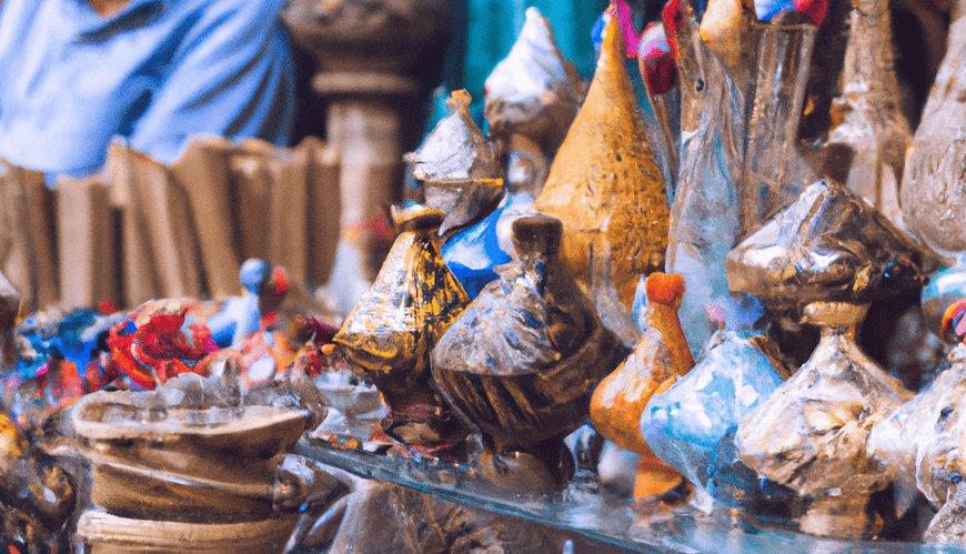 Man beside colourful ceramic wares at market.